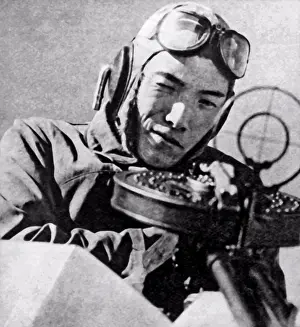 Aviation Prints: Japan: 1941. A Japanese pilot looking through a gun sight