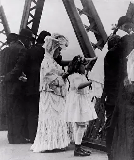 Celebrations Prints: Jews praying on the Williamsburg Bridge on Yom Kippur, the Jewish New Year. Ca. 1909