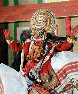 Asian Ethnicity Prints: Kathakali dancer performing on a stage, Kerala, India