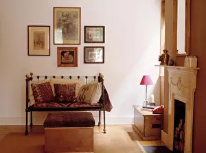 Sitting Rooms Prints: Kelim cushions on small metal settle in uncluttered living room