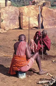 Kenyan Prints: Kenya, Kajiado, Maasai Elders Prepare The Ground For A Meat Feast Which Is Part Of The Initiation Ceremony That Will