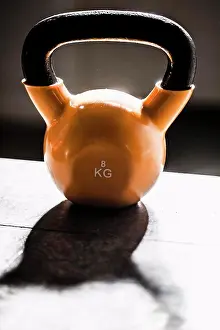 Vertically Prints: Kettlebell weighing 8 KGS on stone stairs