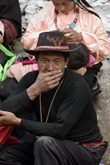 Verticals Prints: Khampa man with Yak hat at the Monlam Chenmo