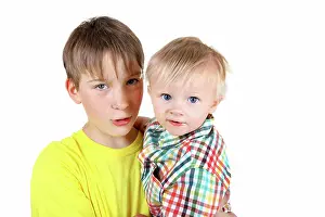 Carry Prints: Kid and Baby Boy Kid and Baby Boy Portrait Isolated on the White Background