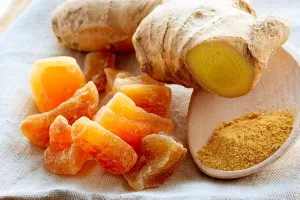 Ginger Prints: Three kinds of ginger - ground spice fresh and candied on rustic table