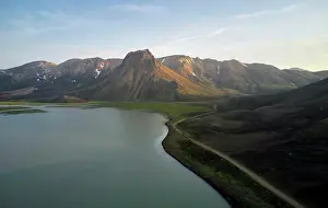 Curve Prints: Lake and road near mountains