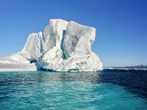 Global Warming Prints: Landscape with icebergs in the Sermilik (Sermiligaaq) Icefjord in the Ammassalik area in East Greenland