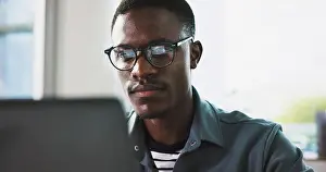 Newspaper Prints: Laptop, glasses and reading with business black man in office for news article