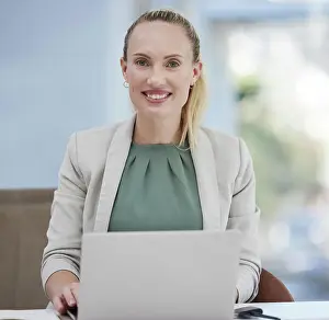 Typing Prints: Laptop, portrait and business woman working at her desk for office planning
