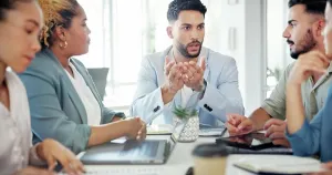 Analytics Prints: Leader, team and meeting for strategy in office for collaboration