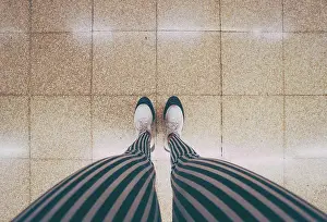 Flooring Prints: legs of a woman waiting in the subway car