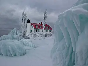 Frozen Prints: Lighthouse at the lakeside in winter