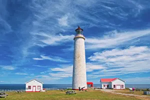 lighthouse on the shore of the St. Lawrence River. Gaspesie Region Cap-des-Rosiers Quebec Canada