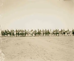 Conference Prints: Line of mounted Bedouins, Pan Islamic conference escort of King Ali and Emir Abdullah