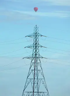 Concentric Prints: Line of pylons in a field outside Radley Village, with passing balloon