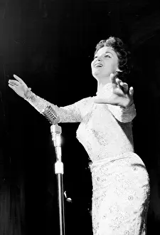 Singing Prints: Lita Roza - Song Supplement -- Billed as 'the girl with the pin-up voice' gives out in her usual style during