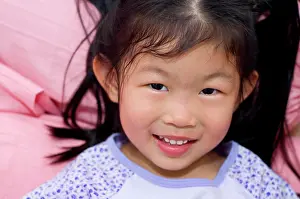 Hinreissend Prints: Little Asian girl lying on bed Little Asian girl lying on bed