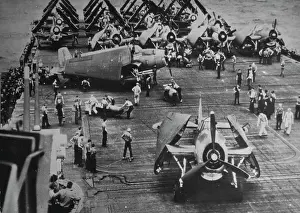 Mode Of Transportation Prints: Loading U.S. Torpedo Bombers For Strike Against Japanese -- Torpedoes are loaded aboard an Avenger bomber
