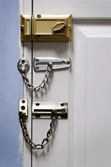 Doorway Prints: Three locks on door