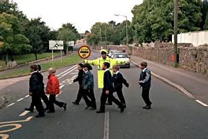 Patrol Prints: Lollipop lady on duty at school crossing patrol