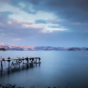 Balance Prints: Long exposure shot of boat pier in winter at lake Toya, Hokkaido, Japan