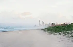 Moody Prints: Looking from Sandspit along the beach towards highrise buildings at Surfers Paradise