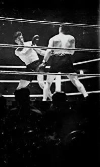Boxer Prints: Loughran Beats Strickland At Wembley -- An incident during the fight between Tommy Loughran of America
