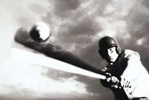 Baseball Prints: Low angle view of a baseball player swinging a baseball bat