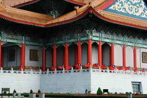 Taiwan Prints: Low angle view of flags flying on the balcony of the National Theater