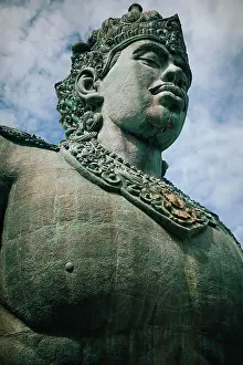 Human Representation Prints: Low angle view of large stone statue of Hindu deity Vishnu