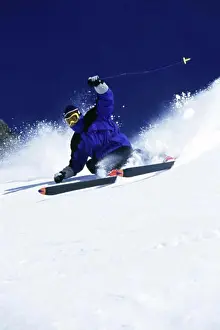 Agility Prints: Low angle view of a man skiing