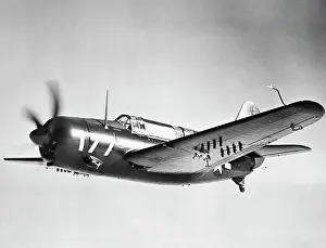 Aircraft Prints: Low angle view of a military airplane in flight