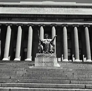 Human Representation Prints: Low angle view of a statue in front of an educational building