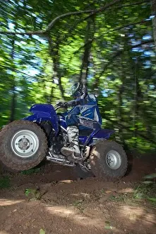 Blur Prints: low angle Yamaha Blaster ATV quad 2003 blue rider wheelie
