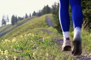 Sseditor Aa Prints: Low section view of a woman running on a hillside