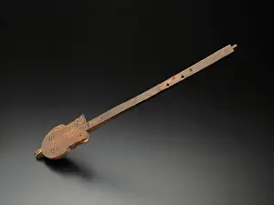 Story Prints: Lute 200-500 Roman/Byzantine Strings ran from the top of this instruments long neck to the end of the sound box