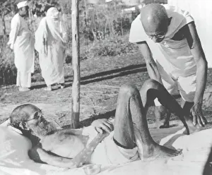 Alter Prints: Mahatma Gandhi giving massage to a leper patient at Sevagram Ashram