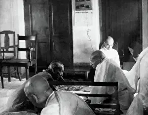 Global Prints: Mahatma Gandhi in a meeting with Janah Asai Ali and others at Khadi Pratishthan