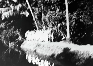 Global Prints: Mahatma Gandhi and his party on march through a forest in the riot stricken area of Noakhali East Bengal Copyright