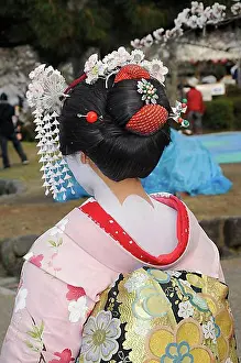 Traditional Attire Prints: A Maiko, a trainee Geisha, showing her typically erotically painted neck