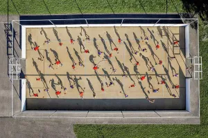 20 To 25 Years Prints: Male and female athletes playing basketball at sports court