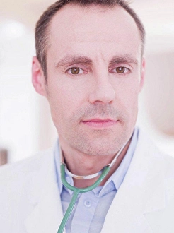 Assisted Prints: a male medic with brown hair, brown eyes