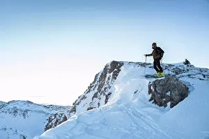 45 To 50 Years Prints: Male mountain climber on mountain summit against sky