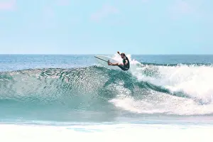 Agility Prints: Male surfer on a wave at sunny day