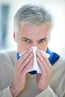 Gray Hair Prints: Man blowing his nose