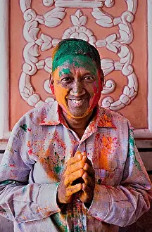 Holi Prints: Man celebrating the Holi spring festival to celebrate the love between Krishna and Radha