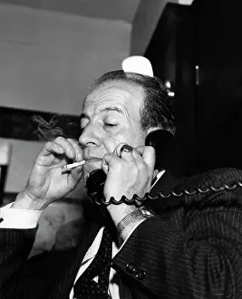 Using Phone Prints: Man with cigarette talking on phone