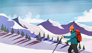 Skier Prints: Man cross-country skiing among snowy mountains