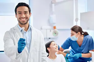 Expert Prints: Man, dentist and toothbrush for hygiene at clinic with patient consultation