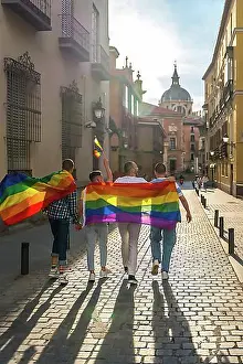 Thirty Prints: Man with his back facing the demonstration with the rainbow flags